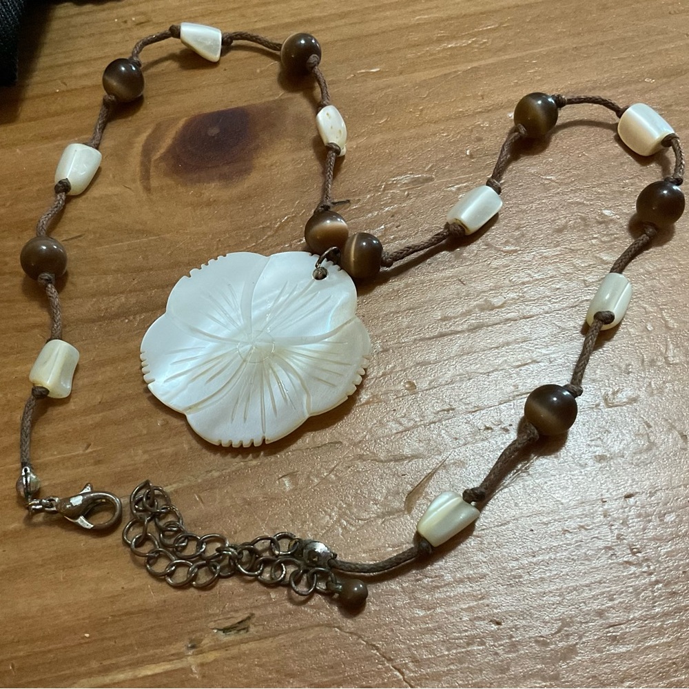 Shell craft Carved iridescent mother of pearl shell pendant brown beads necklace